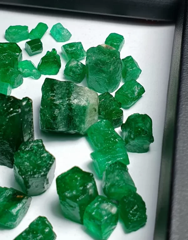 Lot of 56 Natural Swat Emeralds (300 ct) – Various Sizes from 34.36 ct to 1.40 ct